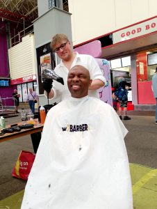 Getting a hair cut at the Mens Health Event at Leeds Market